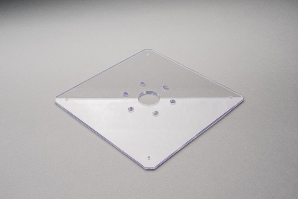 example of a plastic plate with threaded insert holes