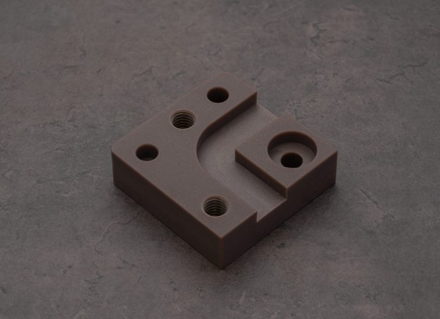 example of a CNC milled part in PET (Glass-Filled, Brown)