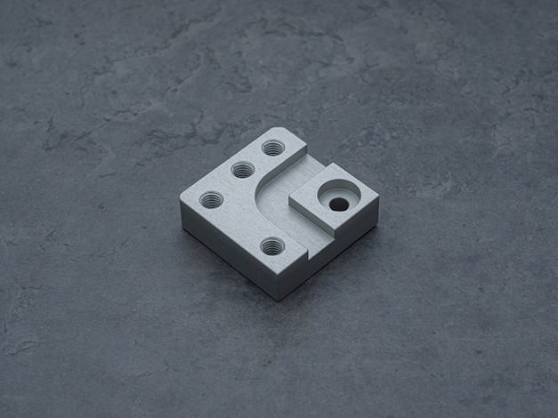 milled part treated in hard anodise clear, matte